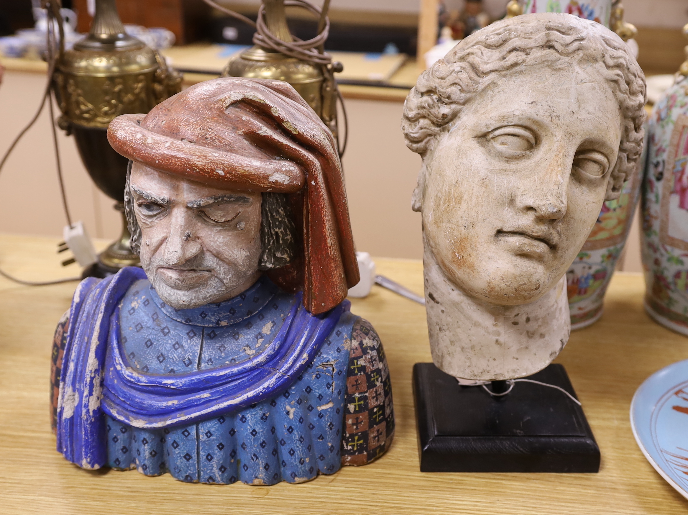 A composition Roman portrait bust and a Della Robbia style painted plaster bust, tallest 39cm